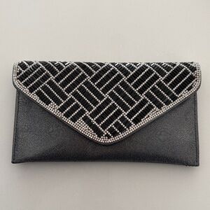 La Regale Black and Silver Geometric Clutch